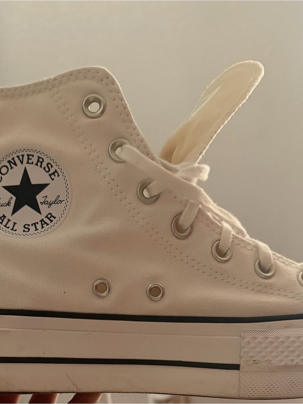 Converse woman’s size 8 Chuck Taylor All Star High Top Sneakers - White